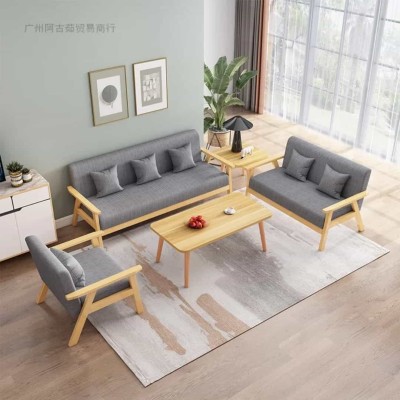 Salon scandinave complet en bois massif avec canapés en tissu