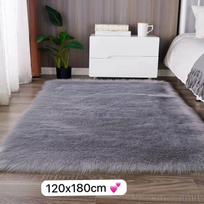 Tapis shaggy en fausse fourrure grise 120x180 cm