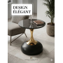 Table d'appoint design en marbre noir et finitions dorées